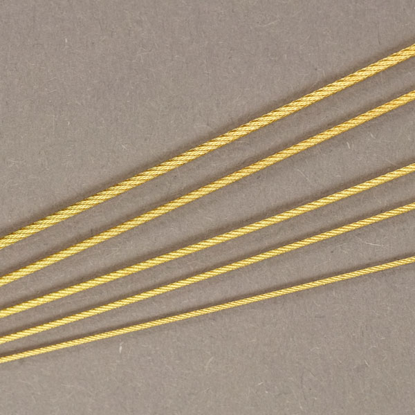 Edelstahlseil 84, goldplattiert 5 Milliem